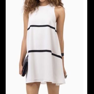 White shift dress with black stripes